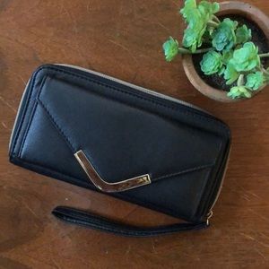 Black wristlet/clutch.